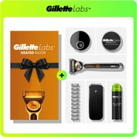 Gillette Labs Heated Razor kit with charging base, moisturiser, shave gel and blades.