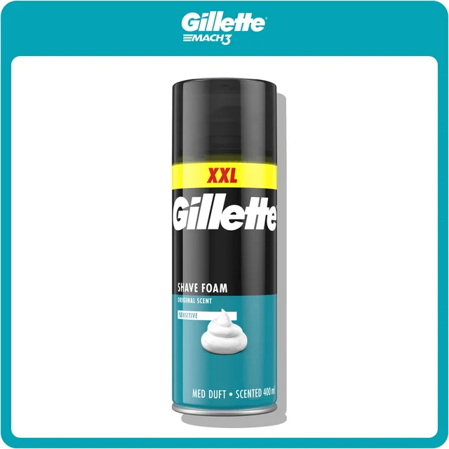 Gillette shave foam, original scent, shown with a dollop of white shaving cream foam on the can.