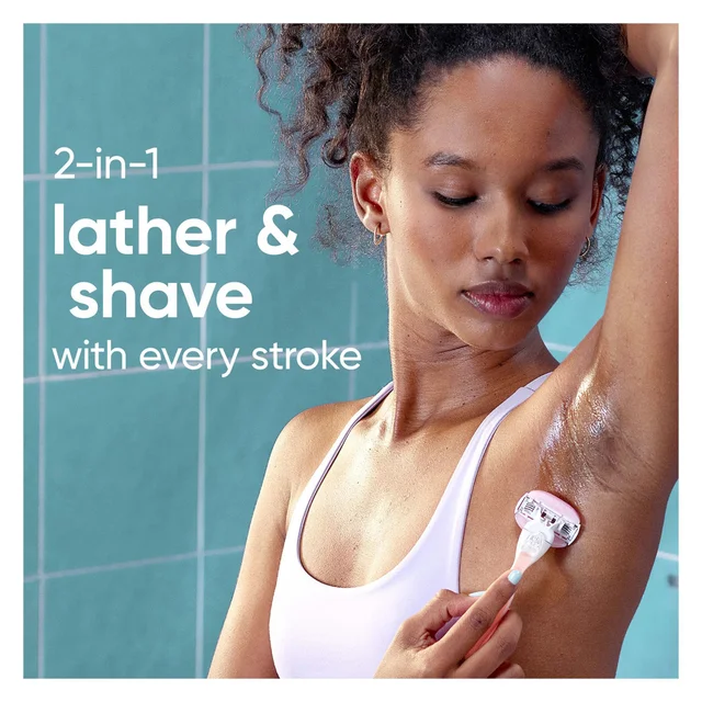 Gillette Venus razor's "2-in-1 lather & shave with every stroke" feature in use.