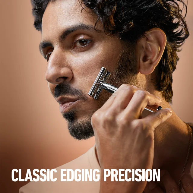 King C. Gillette razor used by a man for classic edging precision.