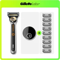Gillette Labs heated razor kit with charging base and 9 blade refills.