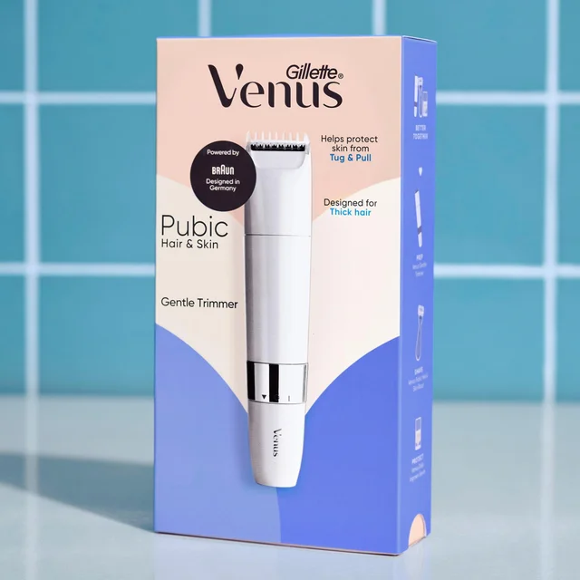 A close-up shot of Gillette Venus Trimmer, positioned against a blue tiled backdrop, showcasing its packaging and product details.